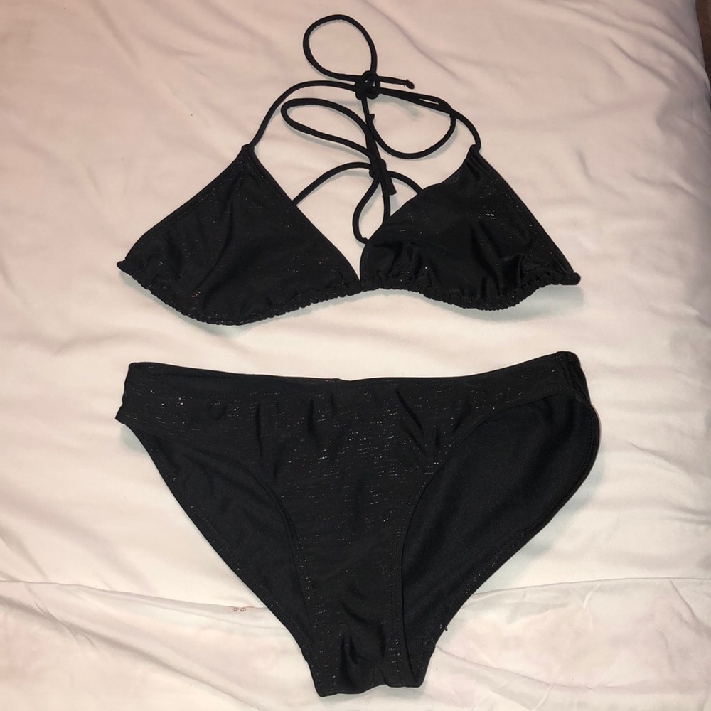 I am selling a black with gold shimmer bikini set.